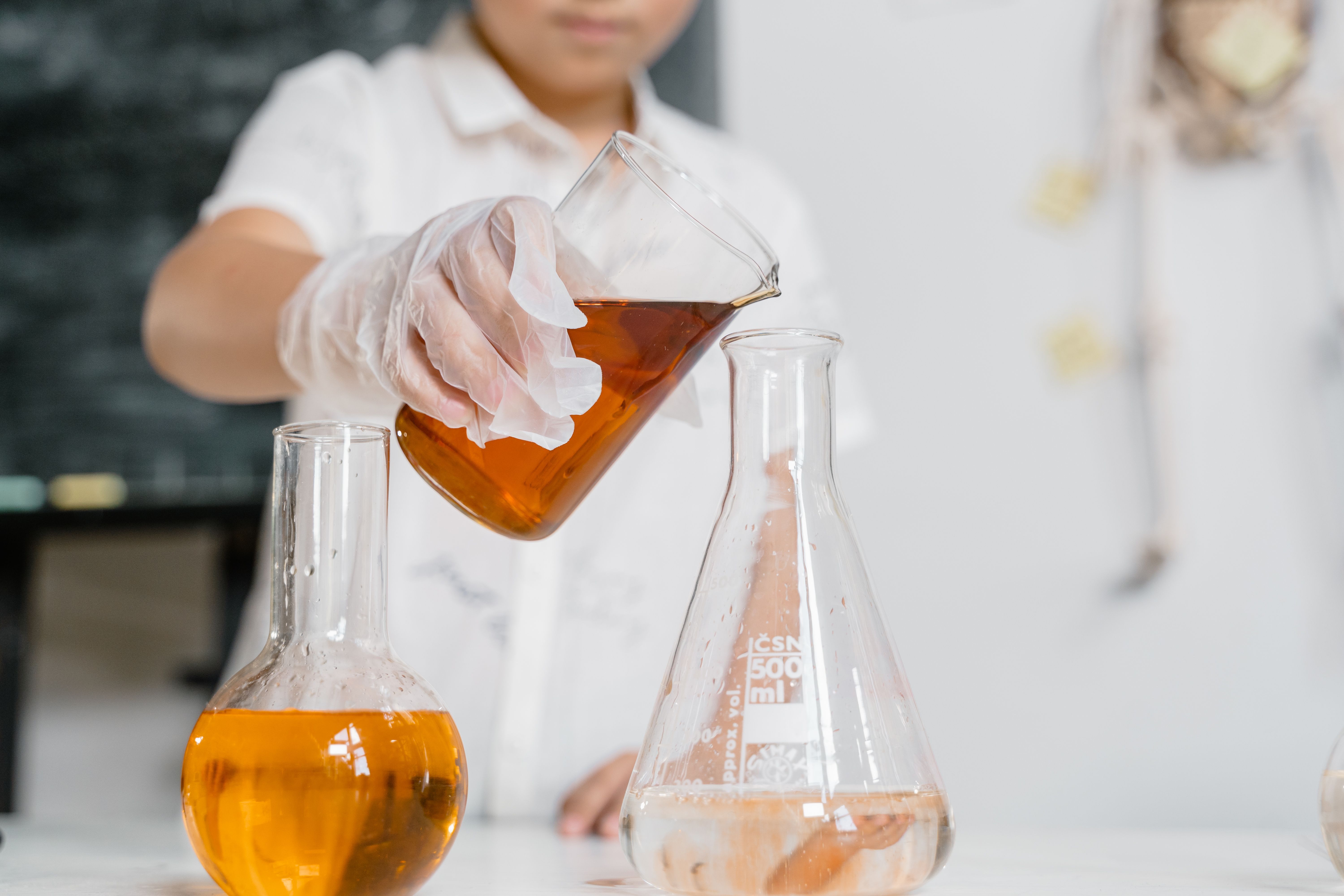 student doing science experiment